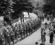British Local Defence Volunteers Marching in Parade, 1940. Creator: British Pathe Ltd