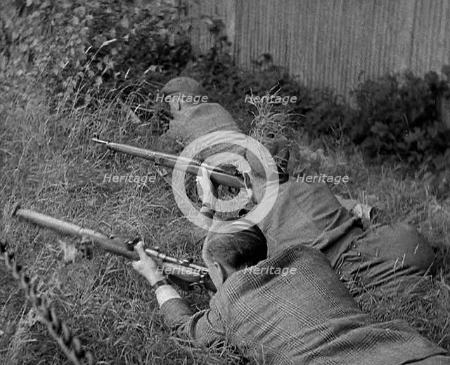 British Local Defence Volunteers Practising Rifle Shooting, 1940. Creator: British Pathe Ltd.