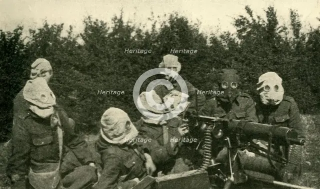 '...British Machine-gun Section wearing anti-gas masks', First World War, 1914-1918, (c1920). Creator: Unknown.