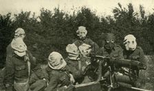 ...British Machine-gun Section wearing anti-gas masks First World War, 1914-1918, (c1920). Creator: Unknown