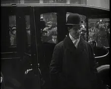 British Member of Parliament Andrew Bonar Law Posing for Photographs in Front of His Car, 1922. Creator: British Pathe Ltd