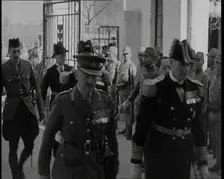 British Military Leaders Walking Through a Gate of Official Building in Shanghai to..., 1937. Creator: British Pathe Ltd