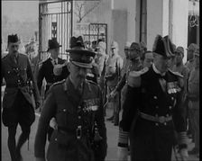British Military Leaders Walking Through a Gate of Official Building in Shanghai to..., 1937. Creator: British Pathe Ltd