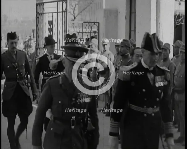 British Military Leaders Walking Through a Gate of Official Building in Shanghai to..., 1937. Creator: British Pathe Ltd.