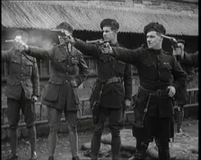 British Officers Firing Revolvers at Targets, 1921. Creator: British Pathe Ltd