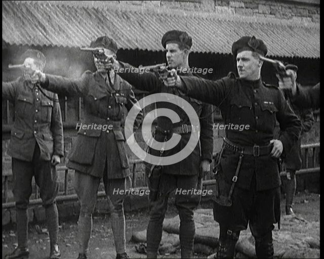 British Officers Firing Revolvers at Targets, 1921. Creator: British Pathe Ltd.