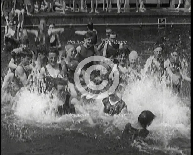 British People Splashing and Playing in the Chiswick Open Air Baths, 1920. Creator: British Pathe Ltd.