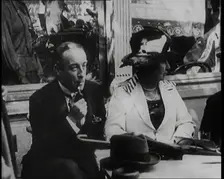 British President of the Board of Trade Stanley Baldwin With His Wife Lucy Baldwin in a..., 1922. Creator: British Pathe Ltd
