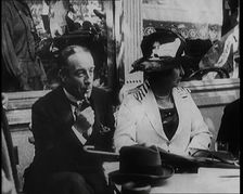 British President of the Board of Trade Stanley Baldwin With His Wife Lucy Baldwin in a..., 1922. Creator: British Pathe Ltd