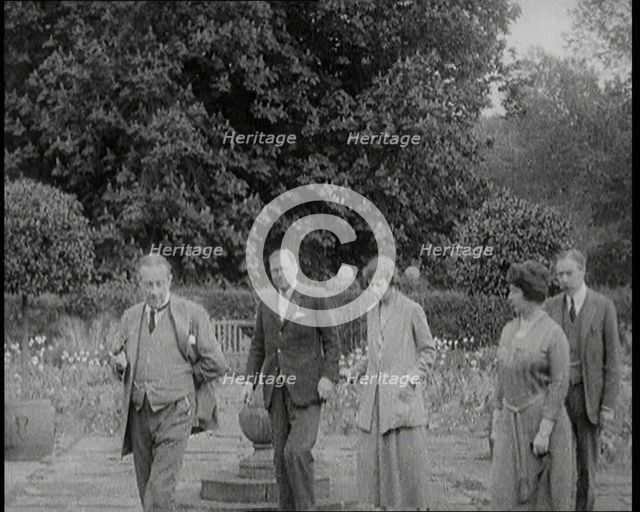 British Prime Minister Stanley Baldwin Walking in the Garden at Chequers, the Country House..., 1924 Creator: British Pathe Ltd.