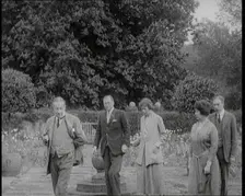 British Prime Minister Stanley Baldwin Walking in the Garden at Chequers, the Country House..., 1924 Creator: British Pathe Ltd