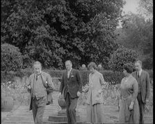 British Prime Minister Stanley Baldwin Walking in the Garden at Chequers, the Country House..., 1924 Creator: British Pathe Ltd