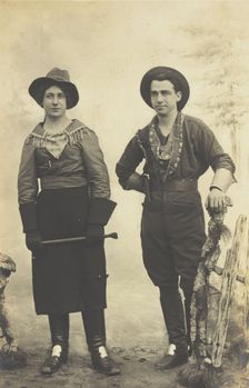 British prisoners of war in cowboy and cowgirl costumes posing at...(1910 - 1919?). Creator: Paul Tharan