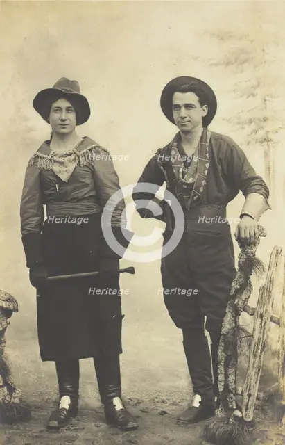 British prisoners of war in cowboy and cowgirl costumes posing at...(1910 - 1919?). Creator: Paul Tharan.