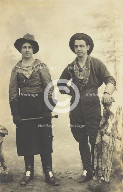 British prisoners of war in cowboy and cowgirl costumes posing at...(1910 - 1919?). Creator: Paul Tharan.