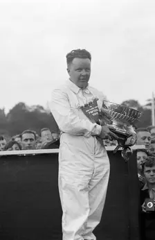 British racing driver Bert Hadley, winner of the Imperial Trophy race, Crystal Palace, 1939. Artist: Bill Brunell
