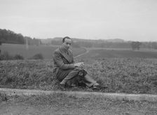 British racing driver Charles Mortimer and his pet dachshund, c1930s Artist: Bill Brunell