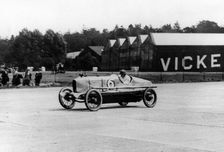 British racing driver George Bedford driving a Hillman at Brooklands, Surrey, 1921. Creator: Unknown