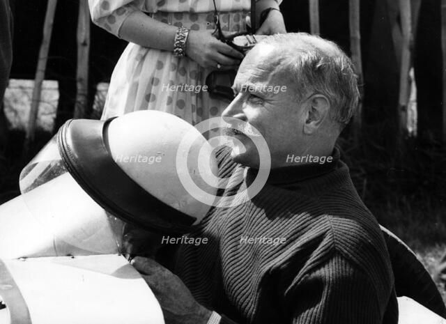 British racing driver John Bolster at Oulton Park, Cheshire 1961. Creator: Unknown.