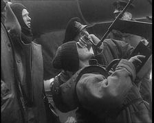British Sailor Firing an Anti Aircraft Gun in Norwegian Coastal Waters, 1940. Creator: British Pathe Ltd