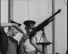 British Sailors Mounting Machine Guns To Small Boats for the Dunkirk Evacuation, 1940. Creator: British Pathe Ltd