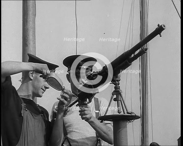 British Sailors Mounting Machine Guns To Small Boats for the Dunkirk Evacuation, 1940. Creator: British Pathe Ltd.
