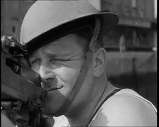 British Sailors Mounting Machine Guns To Small Boats for the Dunkirk Evacuation, 1940. Creator: British Pathe Ltd