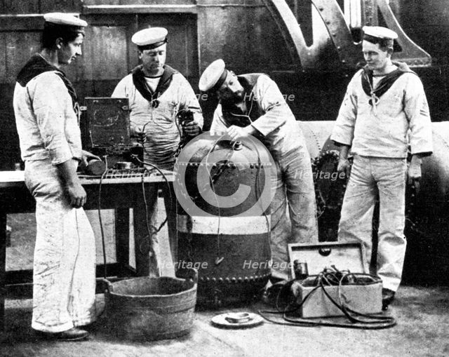 British sailors wiring a mine, First World War, 1914. Artist: Unknown