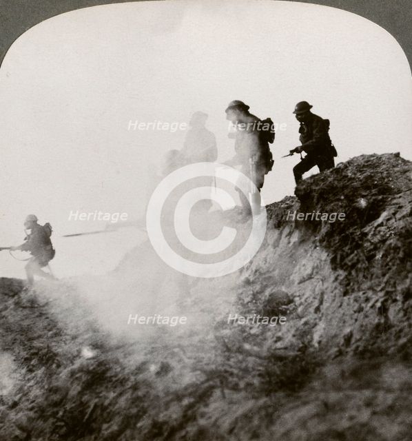 British soldiers advancing under cover of gas and smoke, France, World War I, 1916. Artist: Realistic Travels Publishers