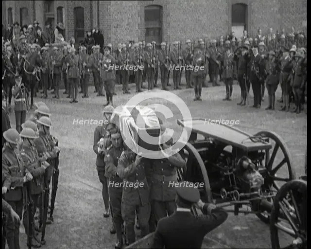 British Soldiers Carrying the Coffin of a British Soldier Draped in the Union Flag, 1920. Creator: British Pathe Ltd.