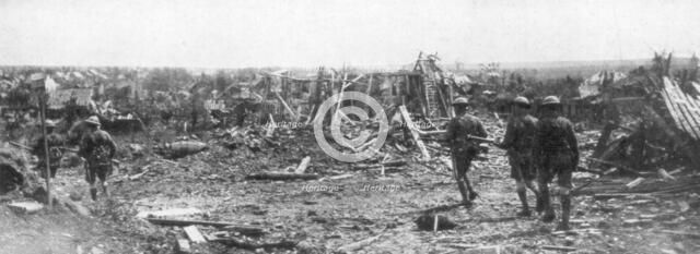 British soldiers exploring the ruins of Albert, Somme, France, 22 August 1918. Artist: Unknown
