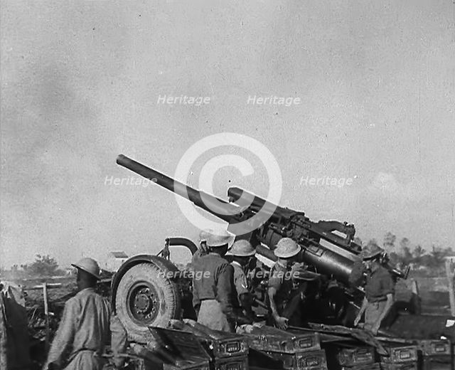 British Soldiers Firing Artillery, 1944. Creator: British Pathe Ltd.