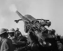 British Soldiers Firing Artillery, 1944. Creator: British Pathe Ltd