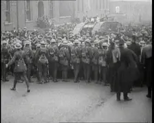 British Soldiers Holding Back Crowds of Demonstrators in Dublin as a Tank Moves Through to..., 1920. Creator: British Pathe Ltd
