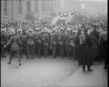 British Soldiers Holding Back Crowds of Demonstrators in Dublin as a Tank Moves Through to..., 1920. Creator: British Pathe Ltd