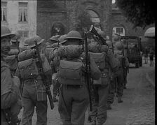 British Soldiers Marching Through a French Town, 1940. Creator: British Pathe Ltd