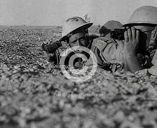 British Soldiers Observing Artillery, 1942. Creator: British Pathe Ltd.