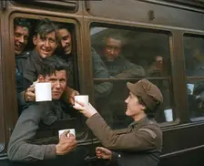 British Soldiers Receiving Food and Drink on the Train Back To Camp, 1940. Creator: British Pathe Ltd