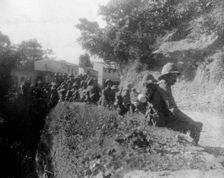 British soldiers resting on a route march, between kalsi and Chakrata, India, 1917