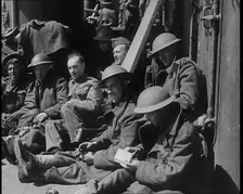 British Soldiers Sitting Aboard a Ship Taking Them Across the Channel Following the..., 1940. Creator: British Pathe Ltd