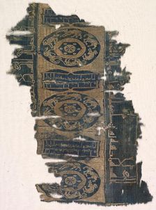 Brocaded silk fragment with running animal roundels and kufic inscriptions, 1530-1950. Creator: Unknown