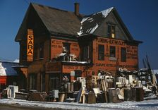 Brockton, Mass., Dec. 1940, second-hand plumbing store, 1940. Creator: Jack Delano