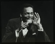Brook Benton singing at the Forum Theatre, Hatfield, Hertfordshire, 28 October 1984. Creator: Denis Williams