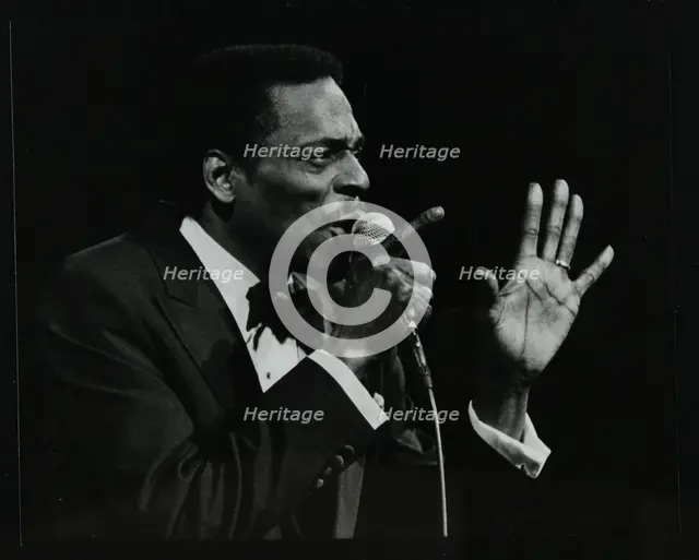 Brook Benton singing at the Forum Theatre, Hatfield, Hertfordshire, 28 October 1984. Creator: Denis Williams.