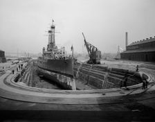 Brooklyn Navy Yard, dry dock no. 4, c.between 1910 and 1920. Creator: Unknown