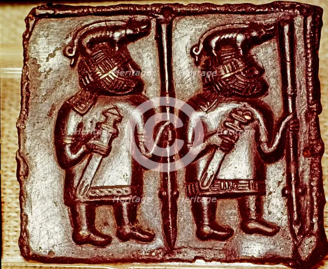 Bronze Matrix for making decorative peaques for helmets, 8th century. Artist: Unknown.