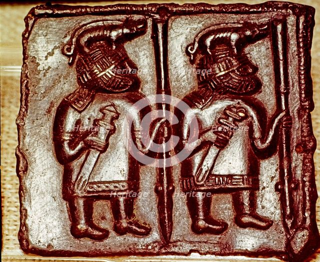 Bronze Matrix for making decorative peaques for helmets, 8th century. Artist: Unknown.