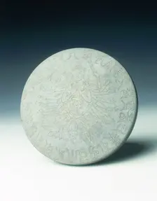 Bronze mirror with multi-armed Avalokitesvara and characters, Yuan dynasty, China, 1271-1368. Creator: Unknown