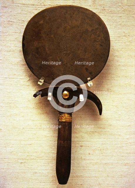 Bronze Mirror with a papyrus handle.