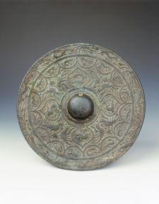Bronze mirror with dragon and phoenix design, early Six Dynasties period, China, mid 3rd century
